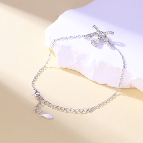 Pearlette - Bracelet à motif nœud en moissanite taille poire avec serti pavé